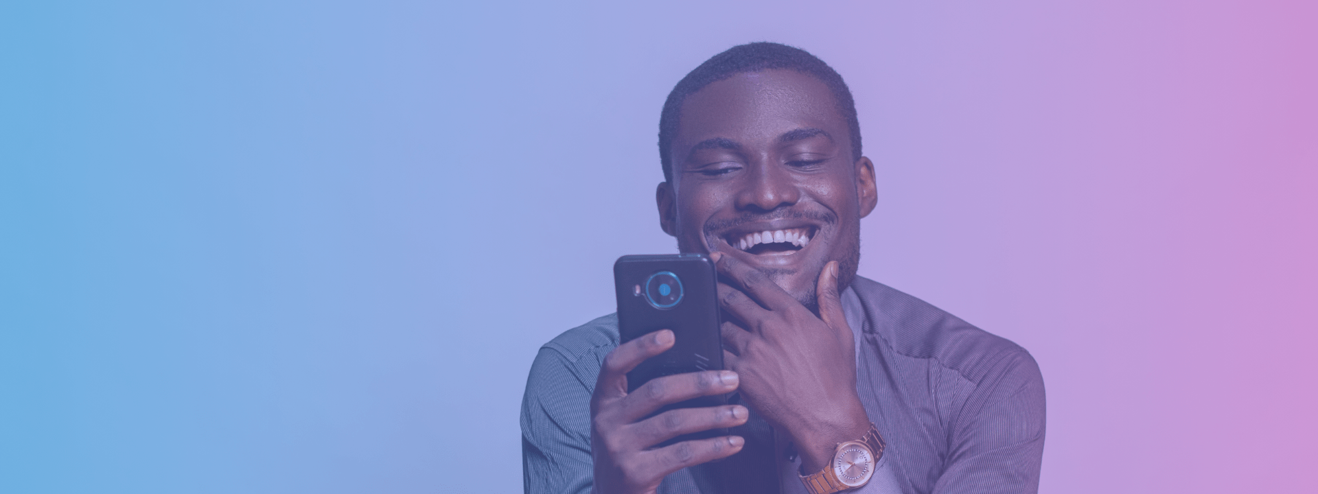 Chapter four banner image of man smiling at cell phone